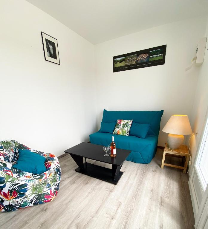 Posezení v ubytování Auberge des Plaines - Appart'hôtel