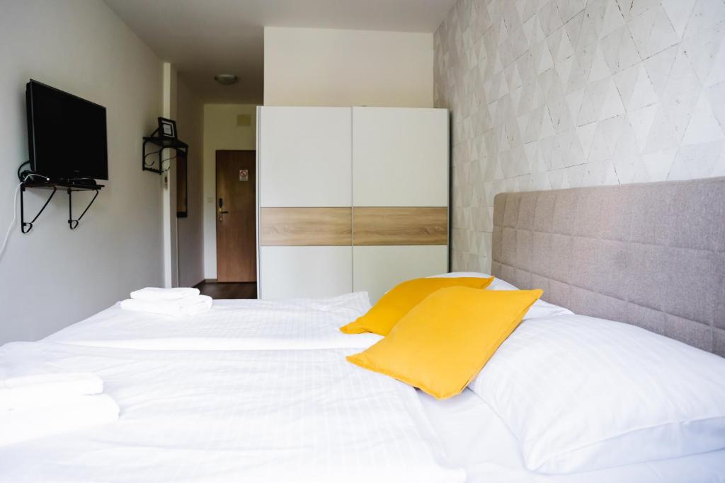 Postel nebo postele na pokoji v ubytování Hotel Arko