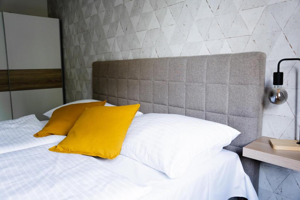 Postel nebo postele na pokoji v ubytování Hotel Arko