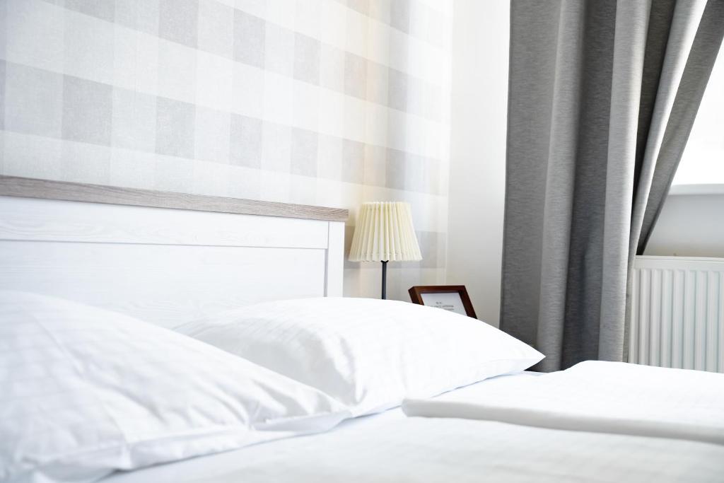 Postel nebo postele na pokoji v ubytování Hotel Arko