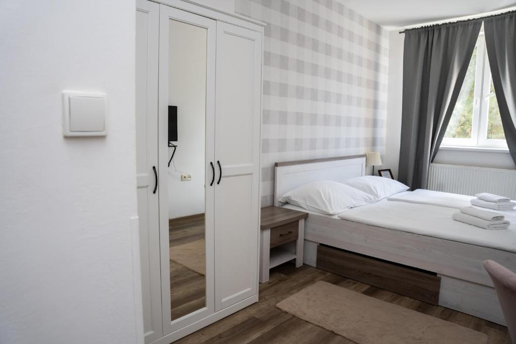 Postel nebo postele na pokoji v ubytování Hotel Arko