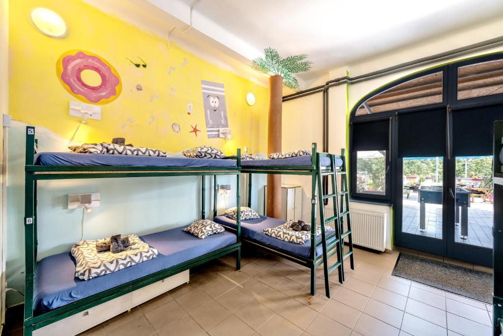 Posteľ alebo postele v izbe v ubytovaní Island Hostel Budapest