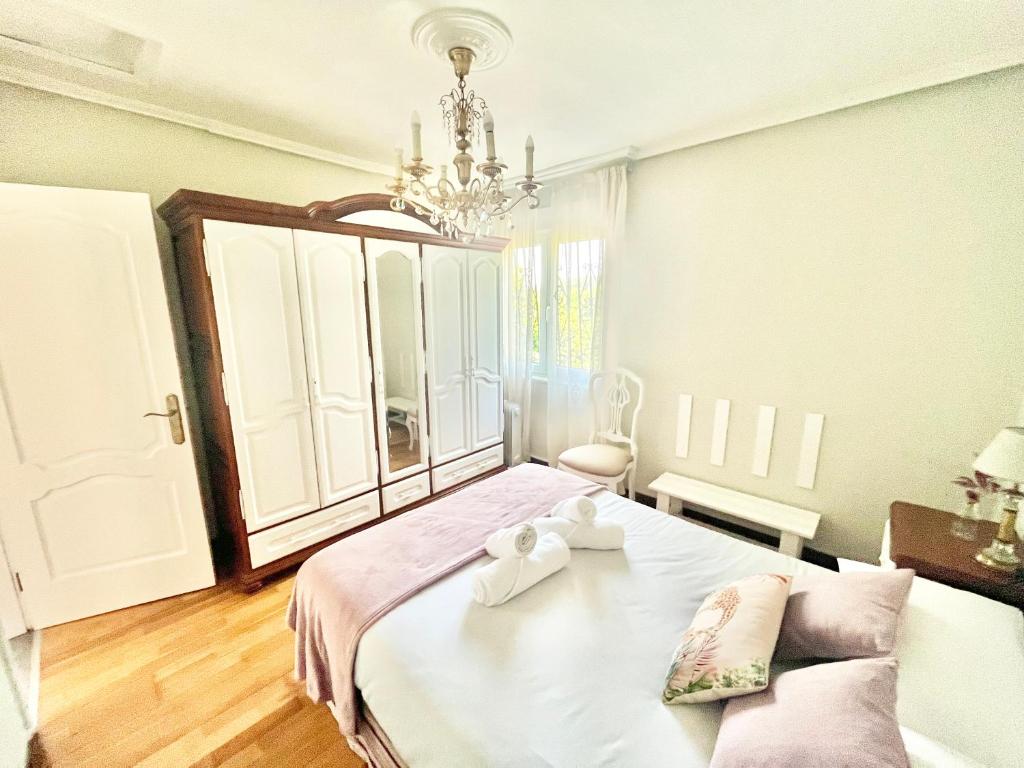 Postel nebo postele na pokoji v ubytování La Casa de la Buganvilla