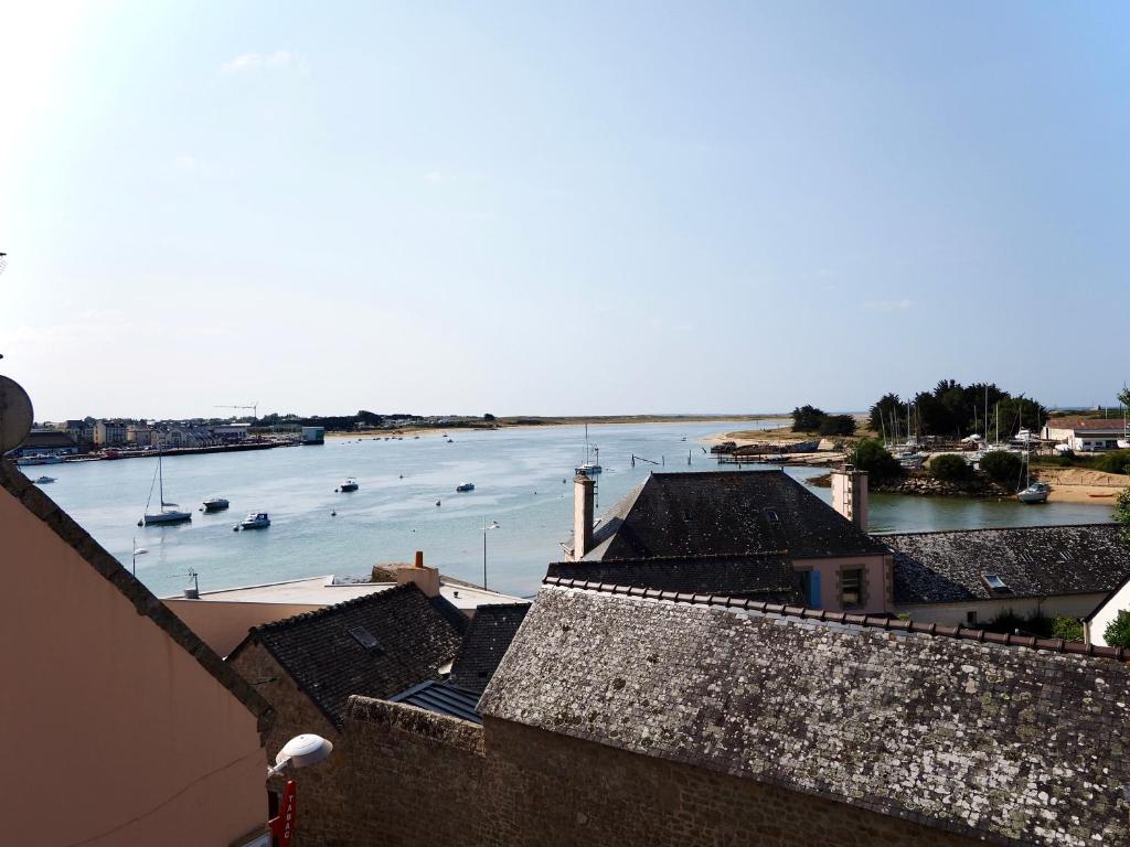 a view of a harbor with boats in the water at 30 m des Plages - Port du Magouër - 6 invités in Plouhinec