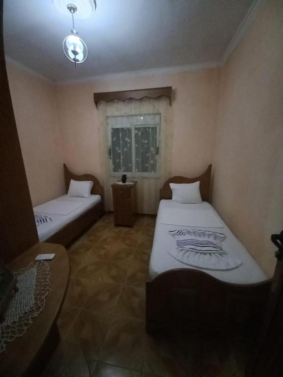 Letto o letti in una camera di MiziriGuestHouse
