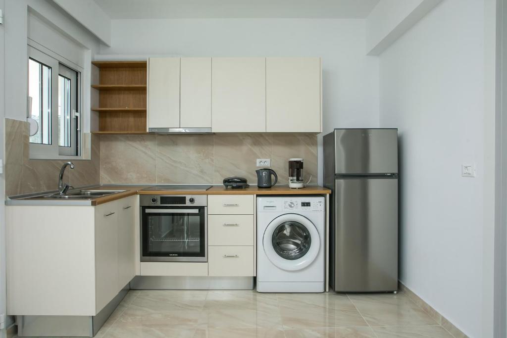 Kuchnia lub aneks kuchenny w obiekcie VOULA APARTMENTS