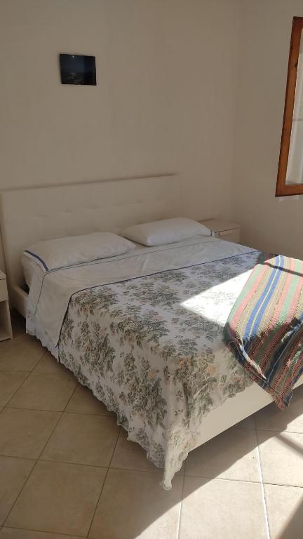Ένα ή περισσότερα κρεβάτια σε δωμάτιο στο Villa mimosa