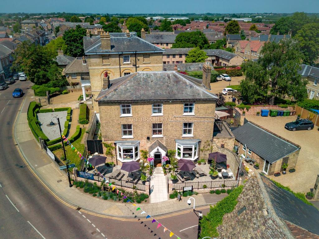 an aerial view of a large brick house on a street at The Bramley House Hotel in Chatteris