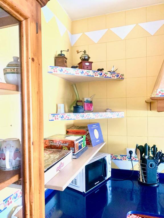 Kuchyň nebo kuchyňský kout v ubytování Can Pantoni piscina privada