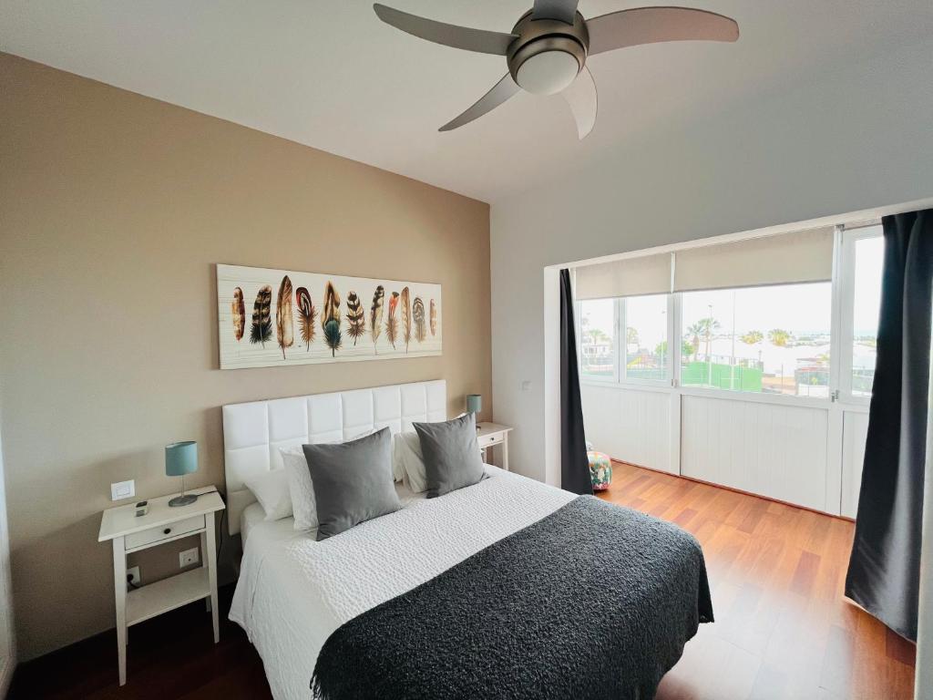 A bed or beds in a room at Casa Lola