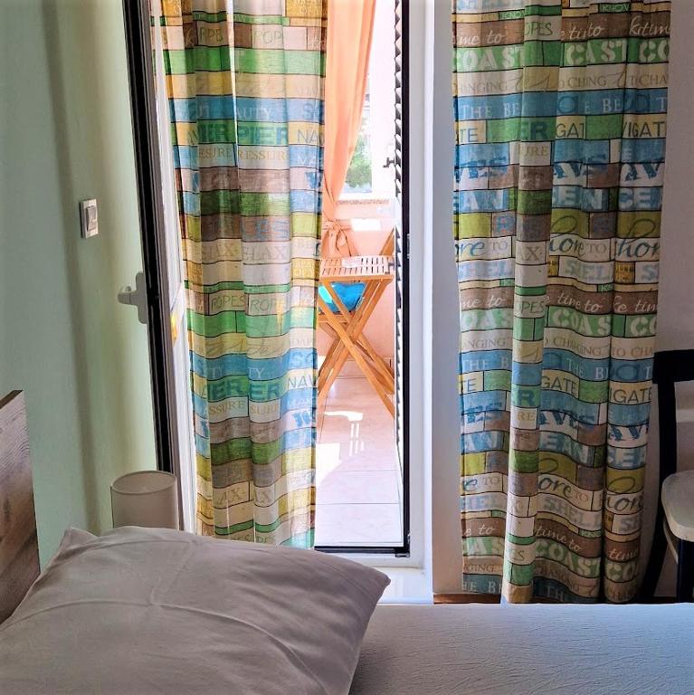 Postel nebo postele na pokoji v ubytování Rooms Bambina