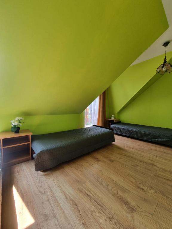 Postel nebo postele na pokoji v ubytování Willa Anna Kluszkowce