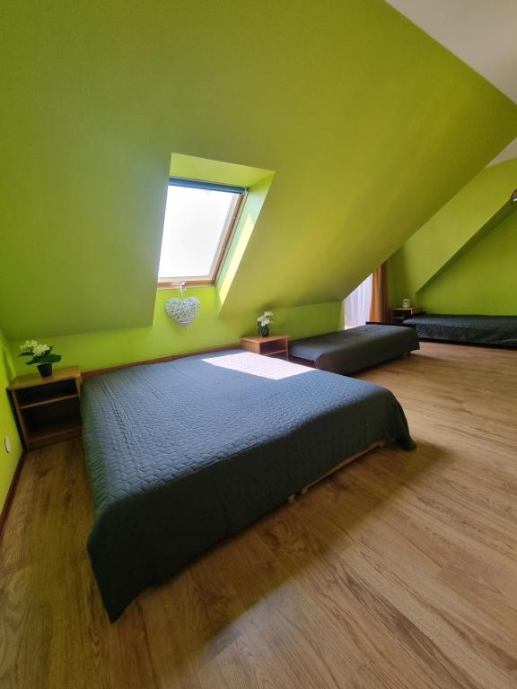 Postel nebo postele na pokoji v ubytování Willa Anna Kluszkowce