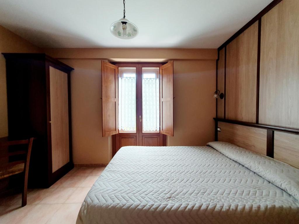 Postel nebo postele na pokoji v ubytování Albergo del Sangro