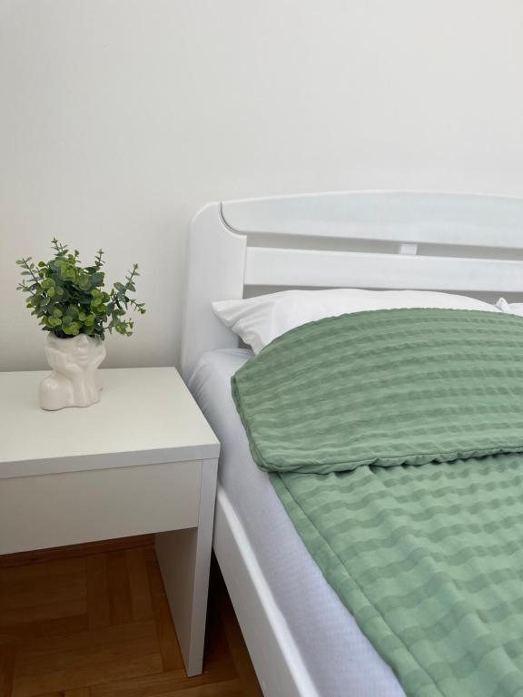 Postel nebo postele na pokoji v ubytování Apartman Spark