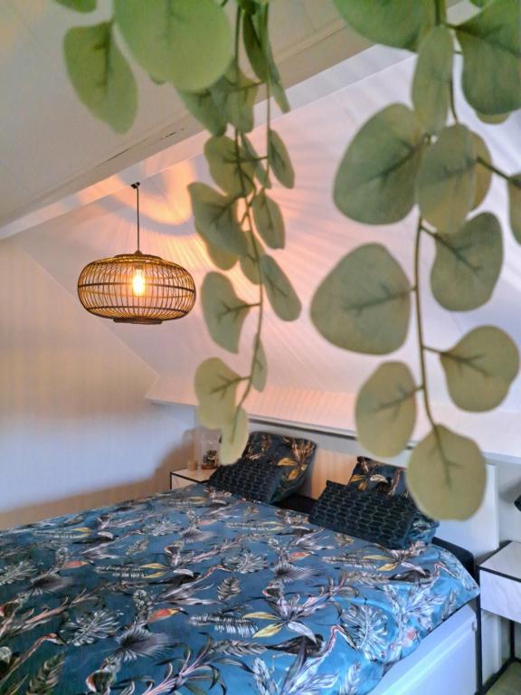 Postel nebo postele na pokoji v ubytování Vakantiehuisje Fie