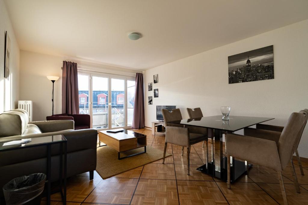 Posezení v ubytování Los Lorentes Residences Bulle