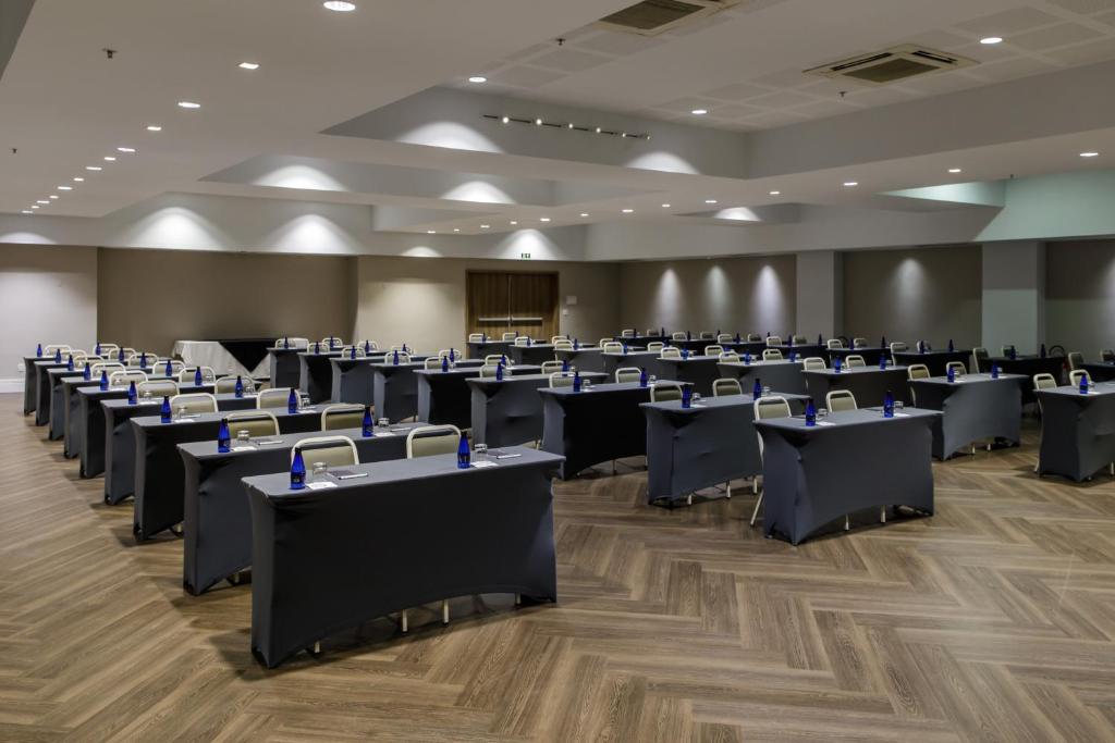A área empresarial e/ ou a sala de conferências de Promenade Link Stay Barra da Tijuca