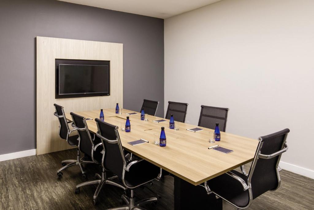 A área empresarial e/ ou a sala de conferências de Promenade Link Stay Barra da Tijuca