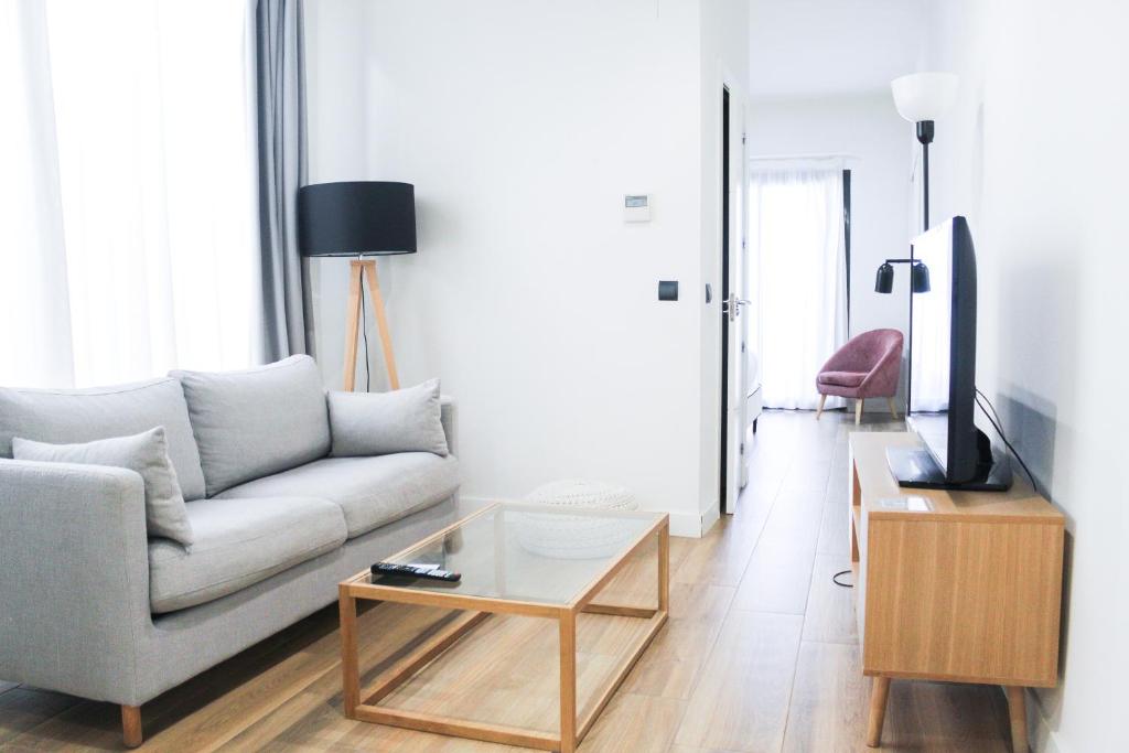 Televízia a/alebo spoločenská miestnosť v ubytovaní Aqua Apartments Málaga