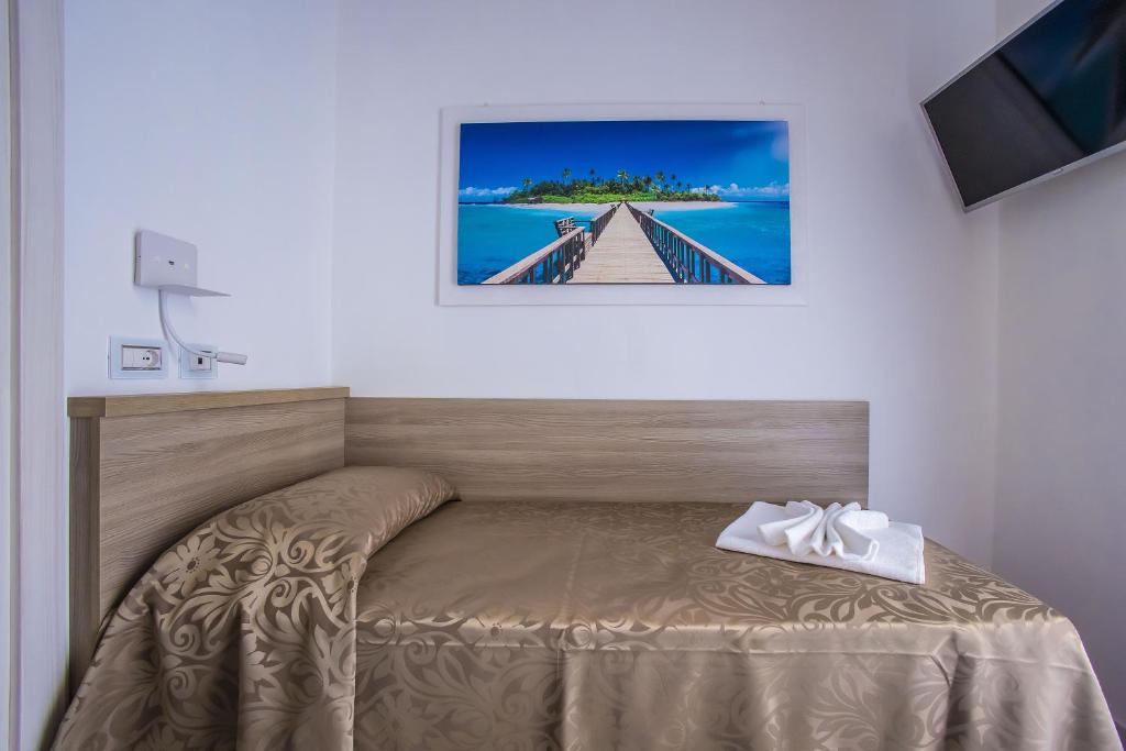 Postel nebo postele na pokoji v ubytování Hotel Orbis