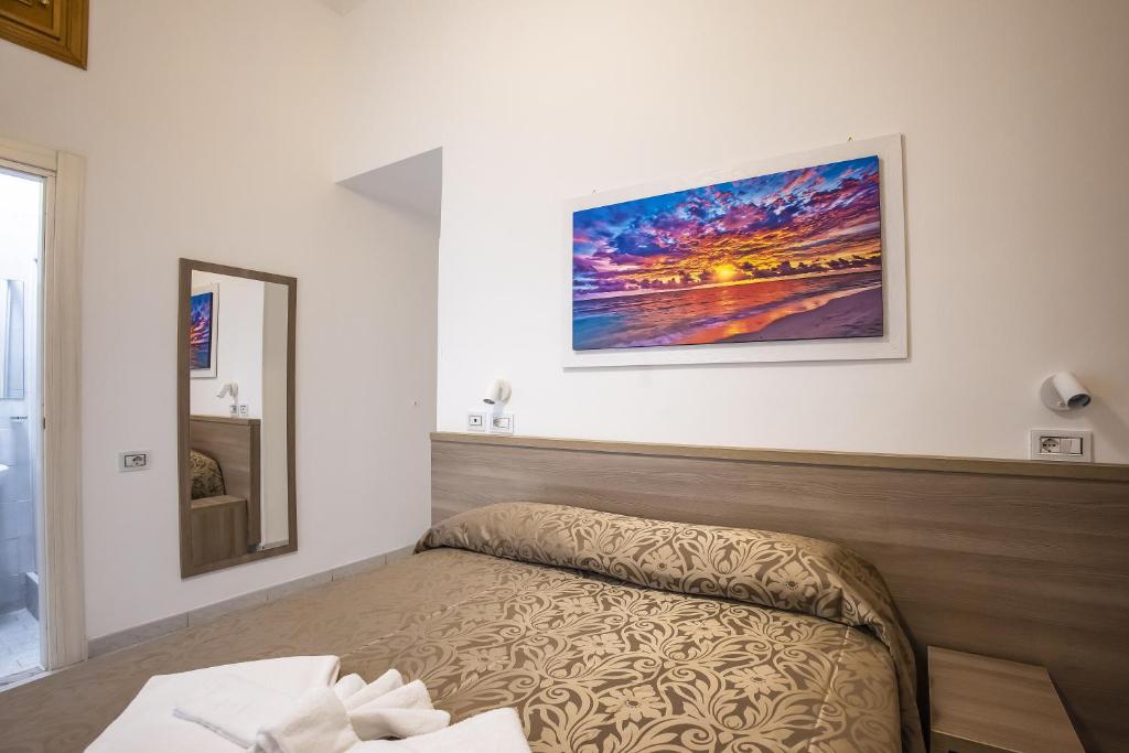 Postel nebo postele na pokoji v ubytování Hotel Orbis
