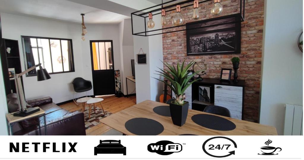 Et tv og/eller underholdning på Le Brooklyn Superbe appartement proximité vieille ville