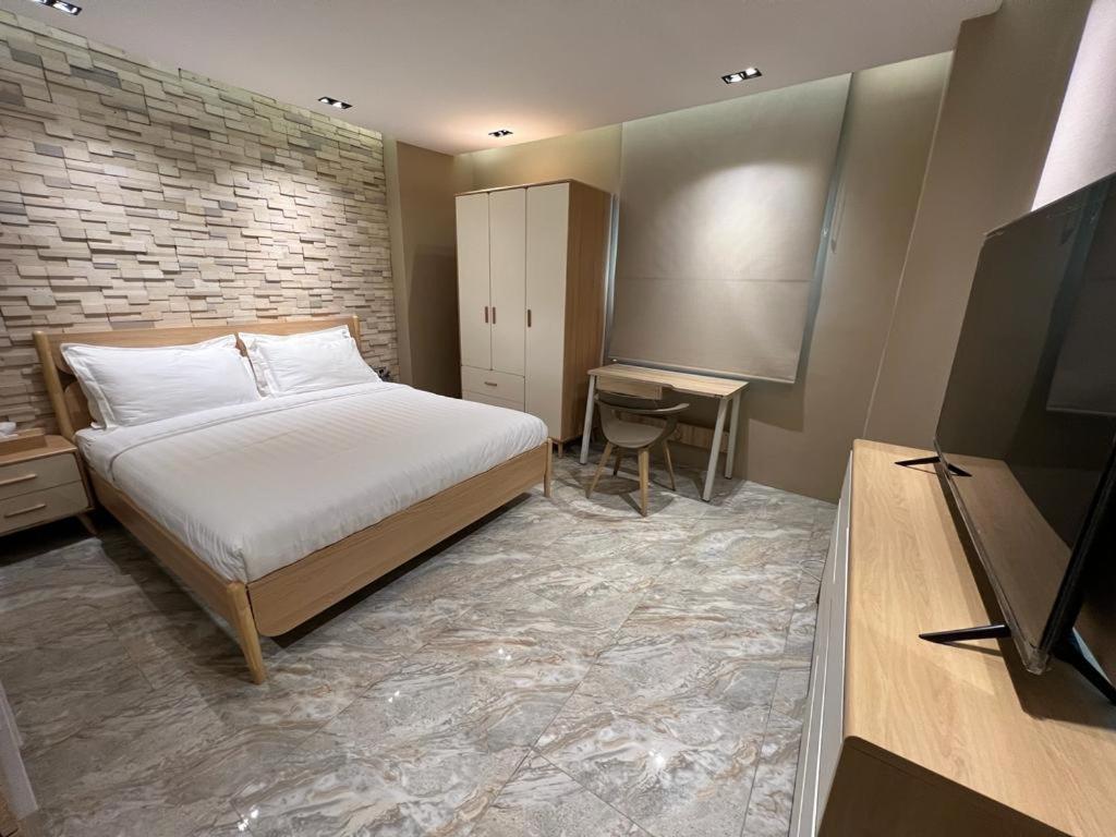 Una cama o camas en una habitación de Choska Residence