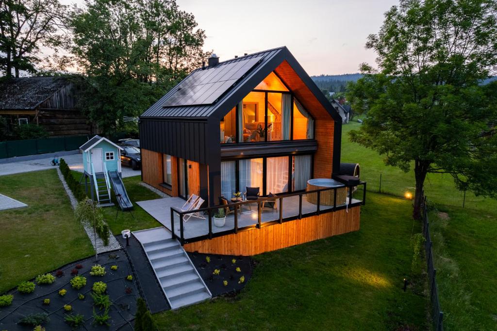 an overhead view of a tiny house with a slide at Kurka Chata in Nowy Targ