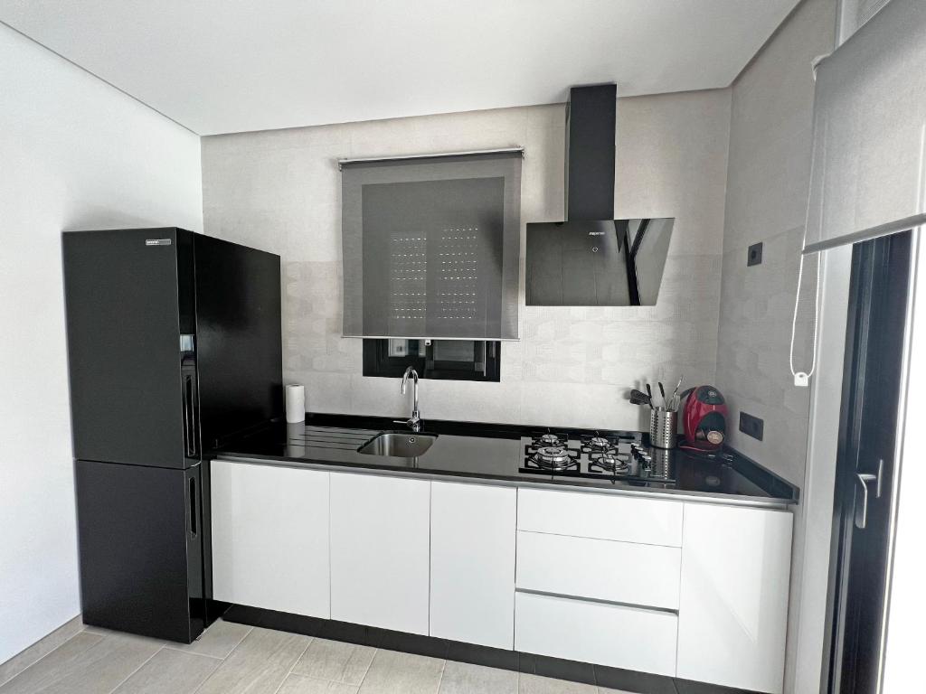 Kuchyň nebo kuchyňský kout v ubytování BAMBÚ SUP · Casa rural en Vejer con piscina privada