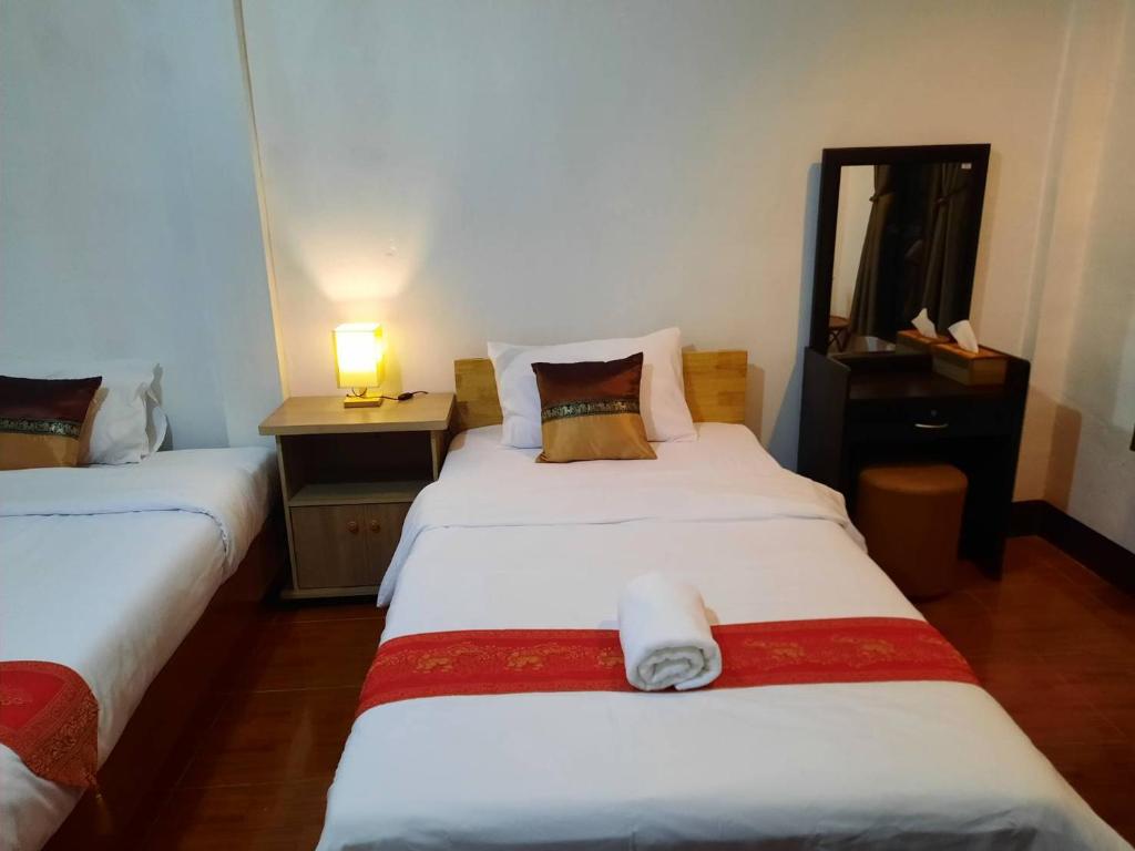 Postel nebo postele na pokoji v ubytování Hotel Pailifornia