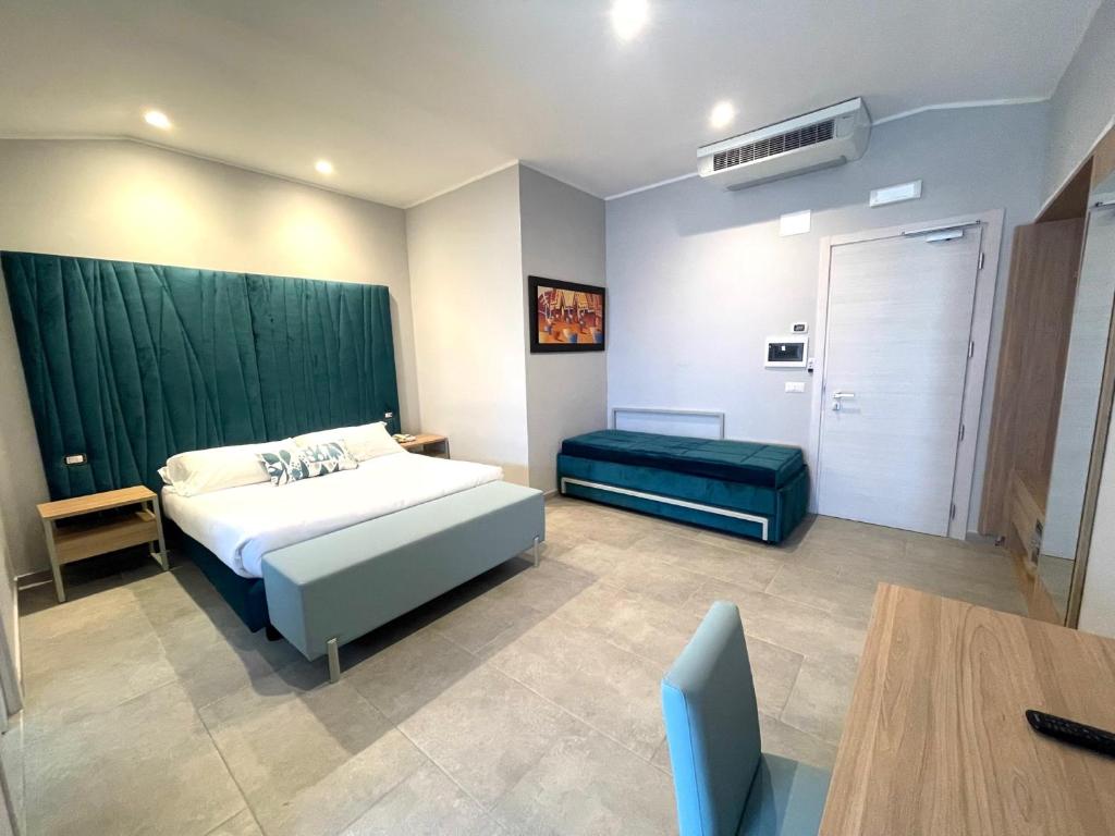 Postel nebo postele na pokoji v ubytování Hotel Sant'Elia