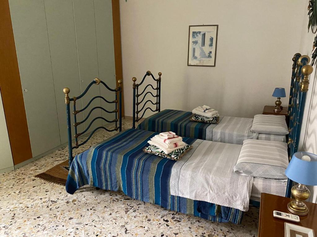 A bed or beds in a room at interno13bari