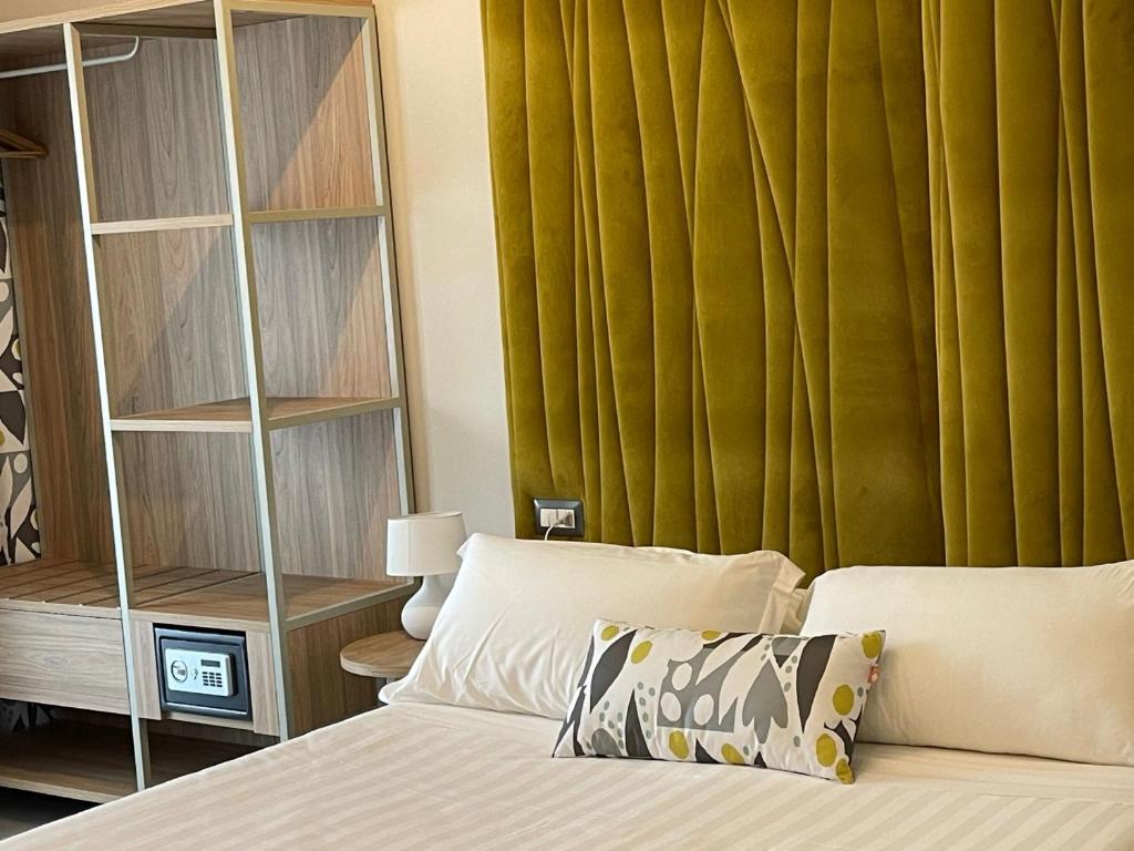 Postel nebo postele na pokoji v ubytování Hotel Sant'Elia