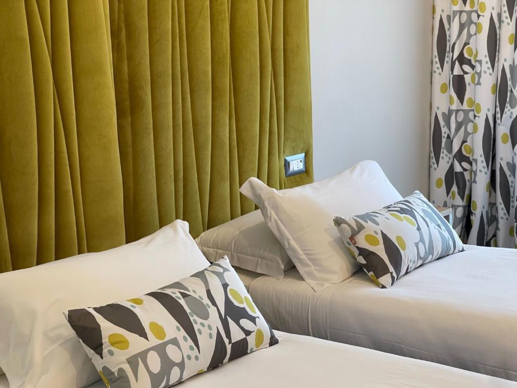 Postel nebo postele na pokoji v ubytování Hotel Sant'Elia