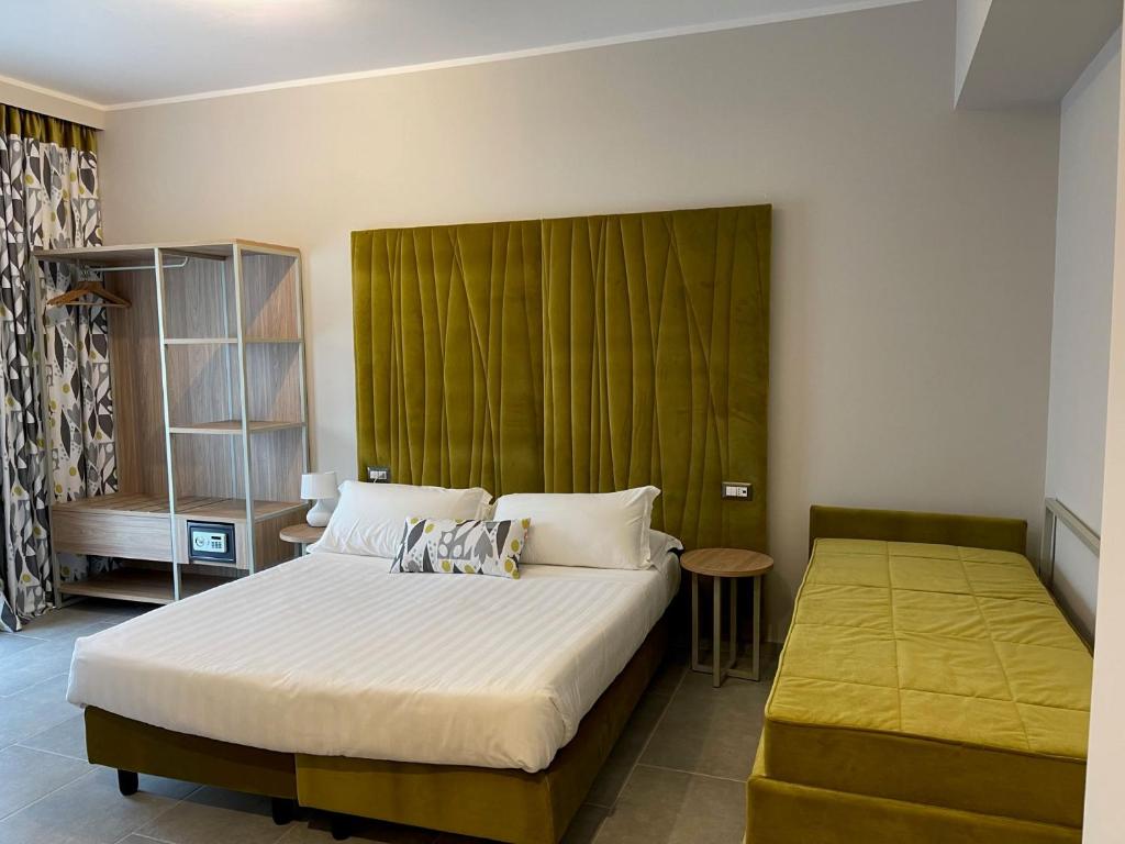 Postel nebo postele na pokoji v ubytování Hotel Sant'Elia