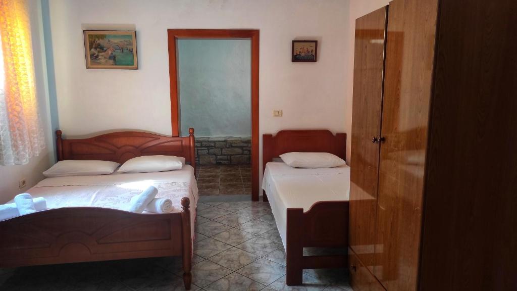 Postel nebo postele na pokoji v ubytování Q Bay Apartments