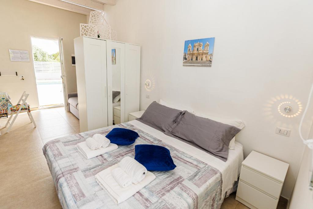 Postel nebo postele na pokoji v ubytování Perladelmare