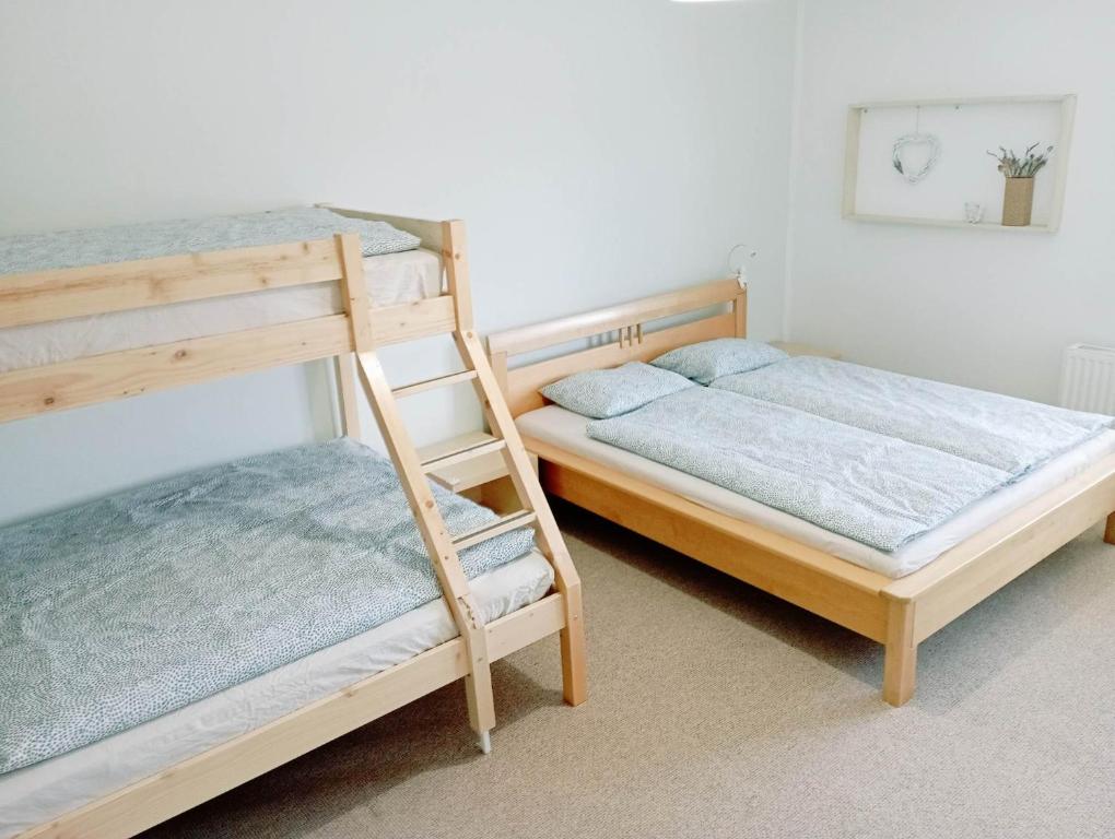 Postel nebo postele na pokoji v ubytování Ubytování U Vojtěšky