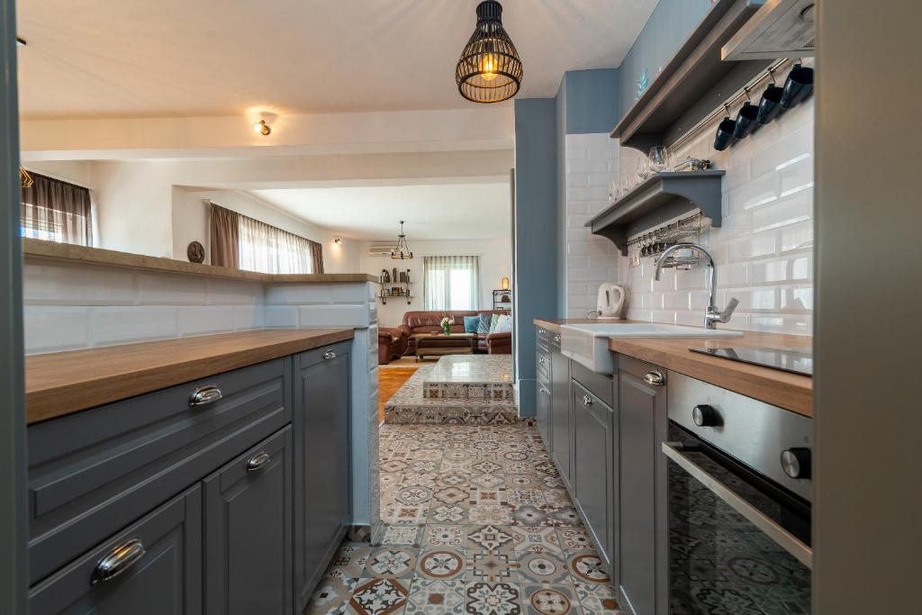 Kuchyň nebo kuchyňský kout v ubytování Apartment Kambel