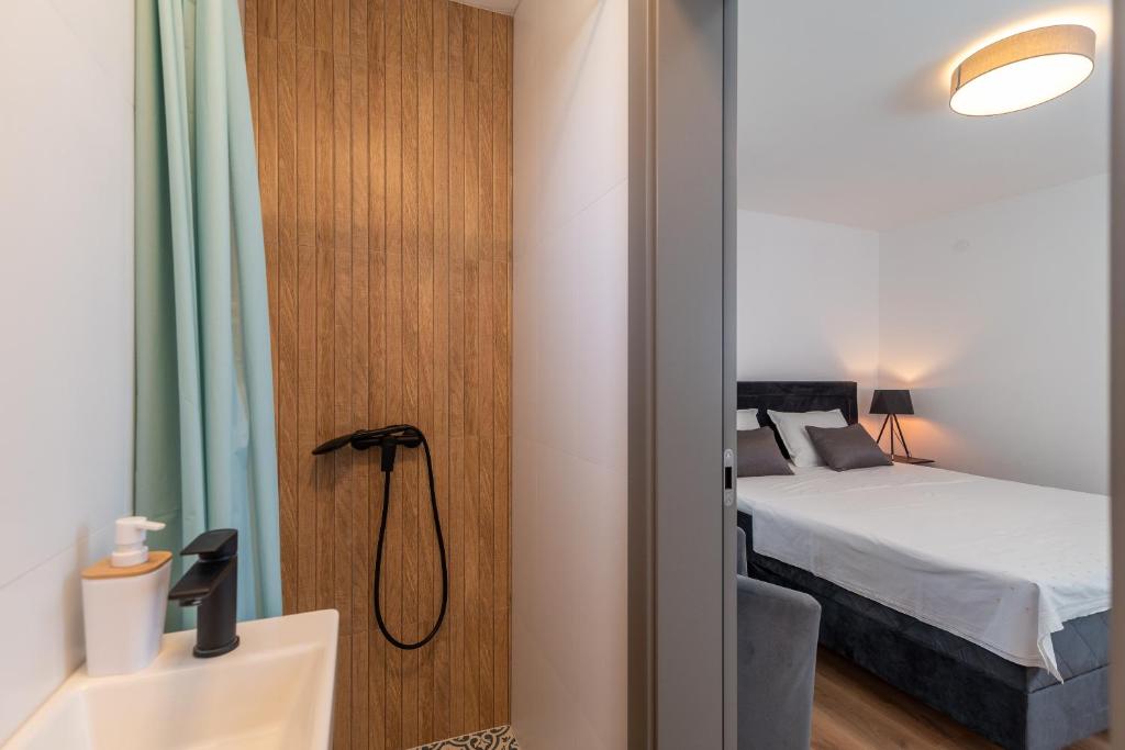 Postel nebo postele na pokoji v ubytování Apartment Kambel