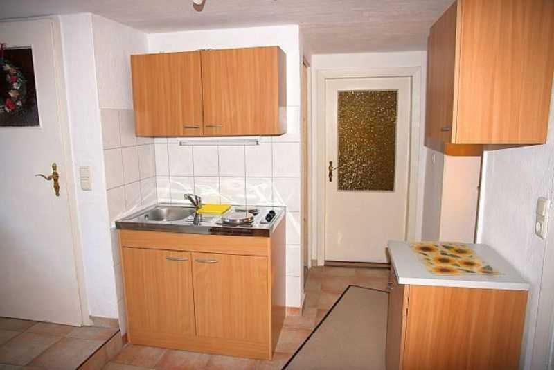 Kuchyň nebo kuchyňský kout v ubytování Ruegen Fewo 208