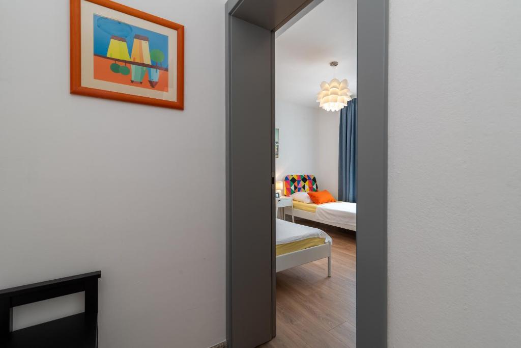 Postel nebo postele na pokoji v ubytování Apartment Kambel