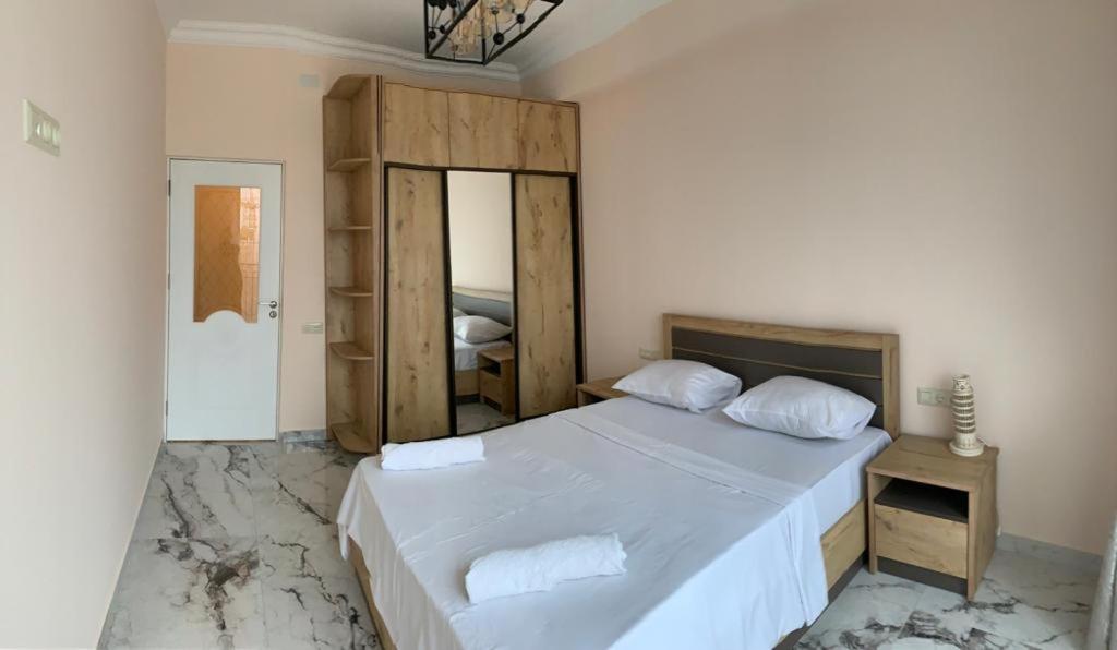 Postel nebo postele na pokoji v ubytování Luxury Apartment with balcony
