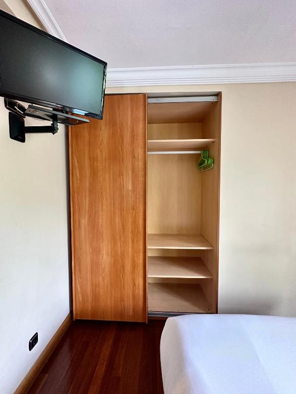 A bed or beds in a room at Pension Anoeta