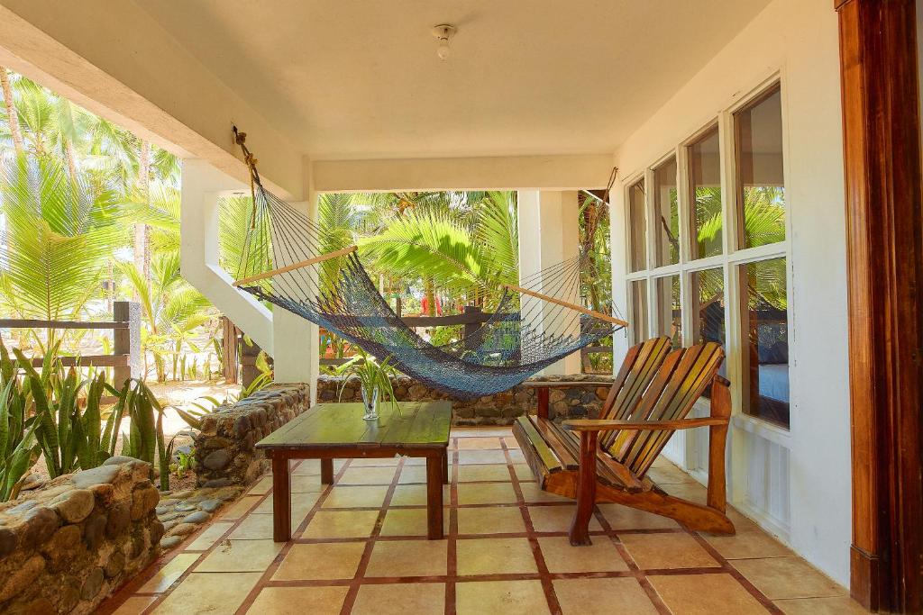 Balkón nebo terasa v ubytování Arrecife Punta Uva - Hospedaje, bar y restaurante - Frente al mar