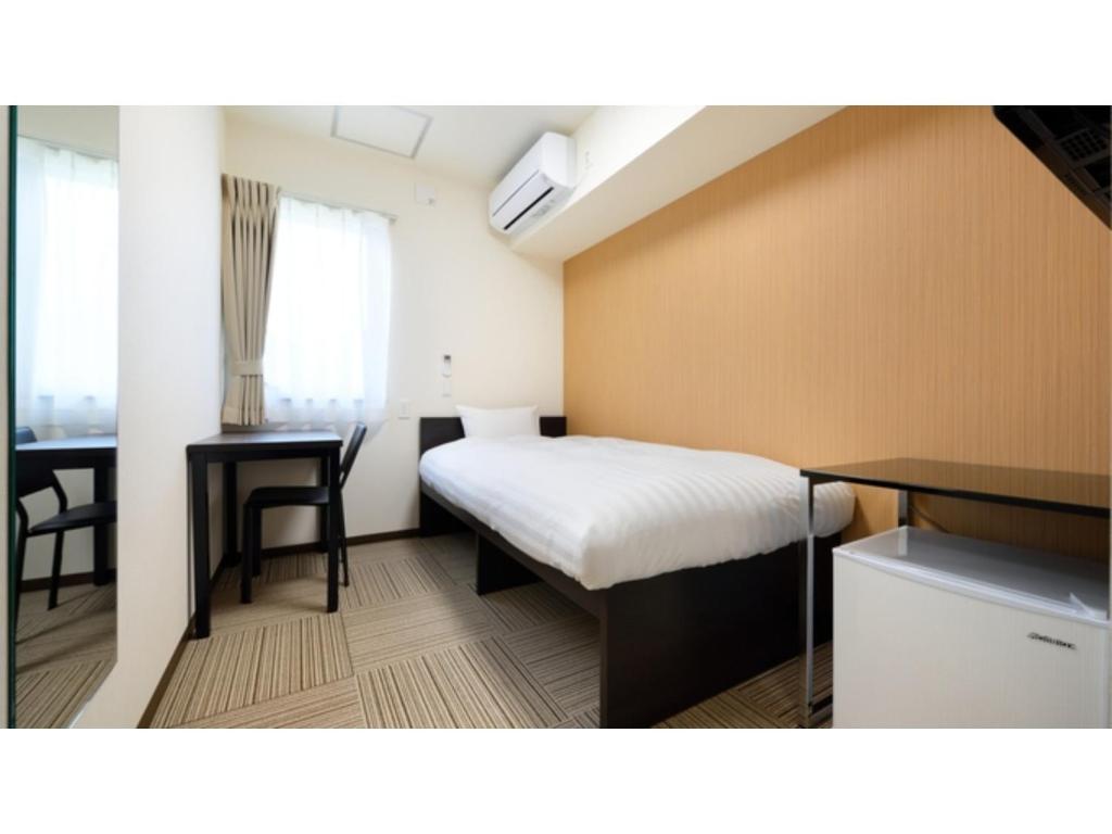 Ліжко або ліжка в номері La'gent Inn Kesennuma - Vacation STAY 85810v