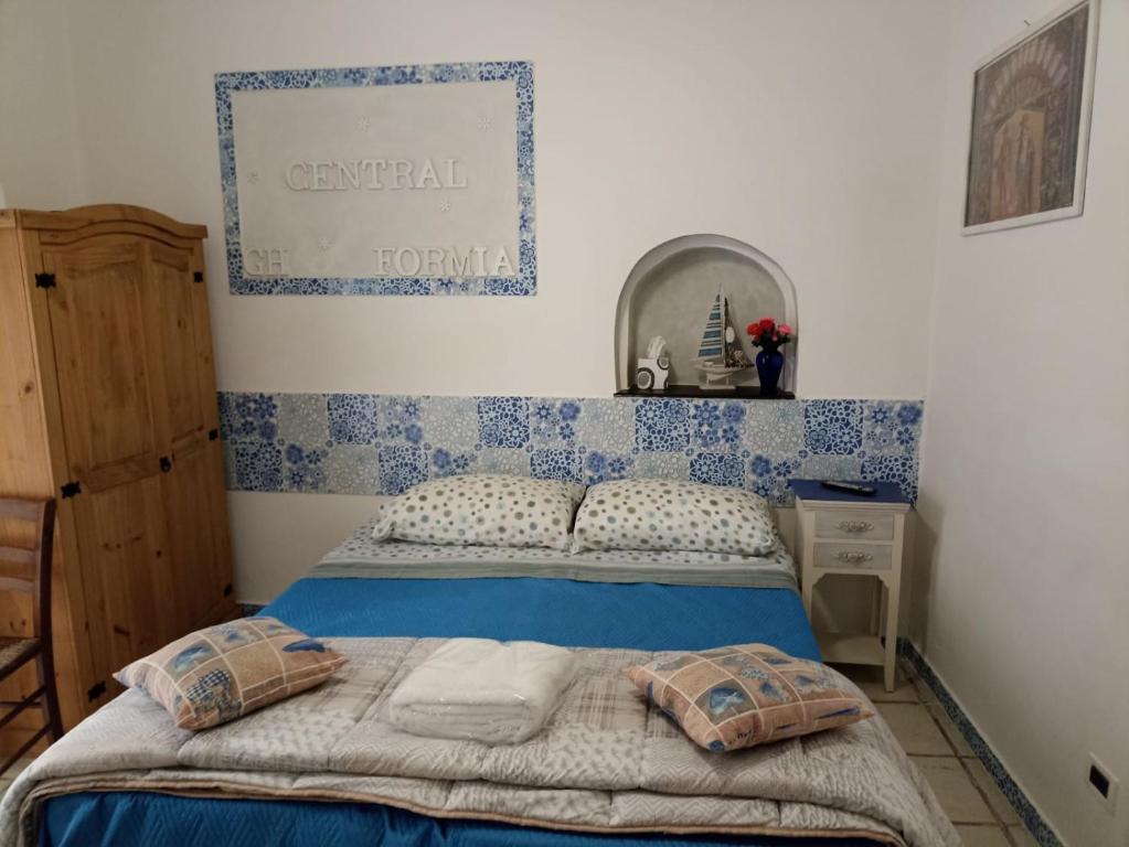 Postel nebo postele na pokoji v ubytování Central GH Formia
