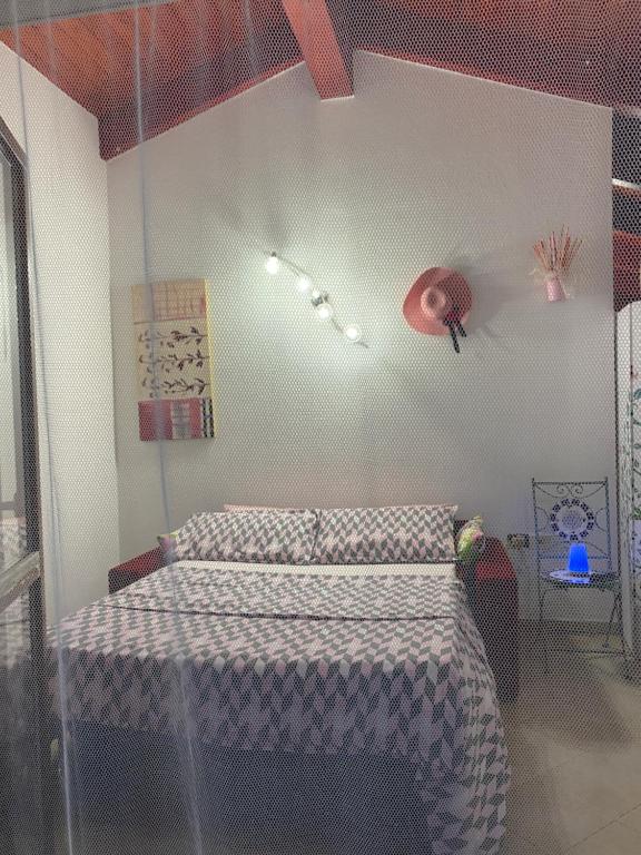 Postel nebo postele na pokoji v ubytování B&B Su Canistreddu