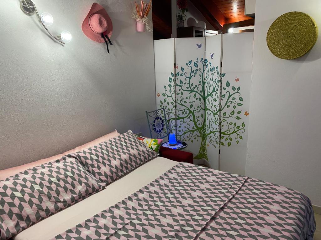 Postel nebo postele na pokoji v ubytování B&B Su Canistreddu